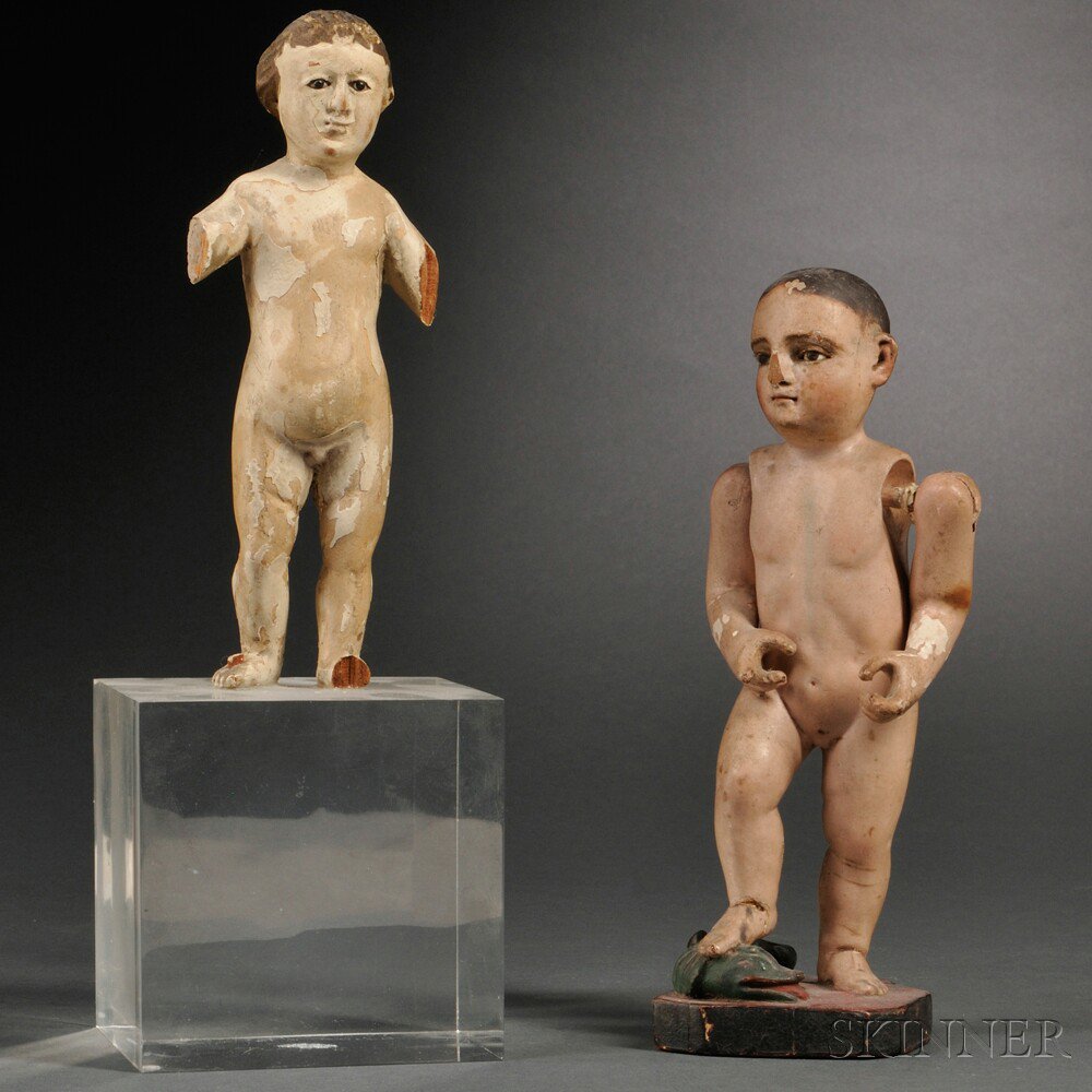 Appraisal: Two Italian Carved and Polychrome-painted Wood Figures one figure with