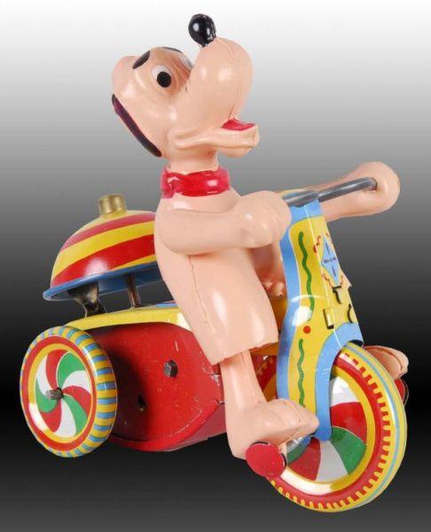 Appraisal: Walt Disney Linemar Disney Pluto Tricycle Toy Description Wind-up Working