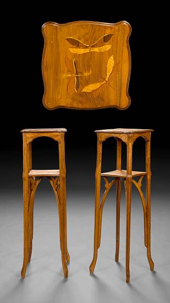 Appraisal: A pair of French Art Nouveau marquetry inlaid walnut two