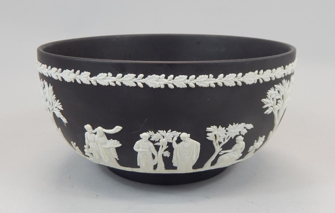 Appraisal: A Wedgwood black Jasperware bowl decorated in typical style with