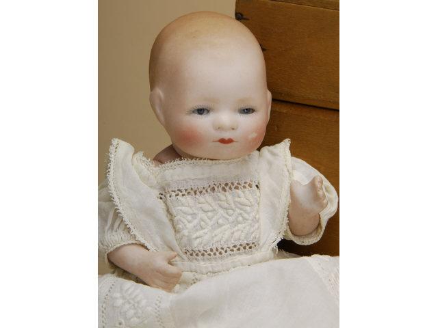 Appraisal: All Bisque Bye-Lo Baby with Wardrobe Germany ca all bisque