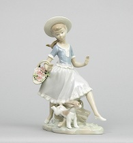 Appraisal: Lladro Girl with a Puppy Porcelain Figurine Porcelain figurine of