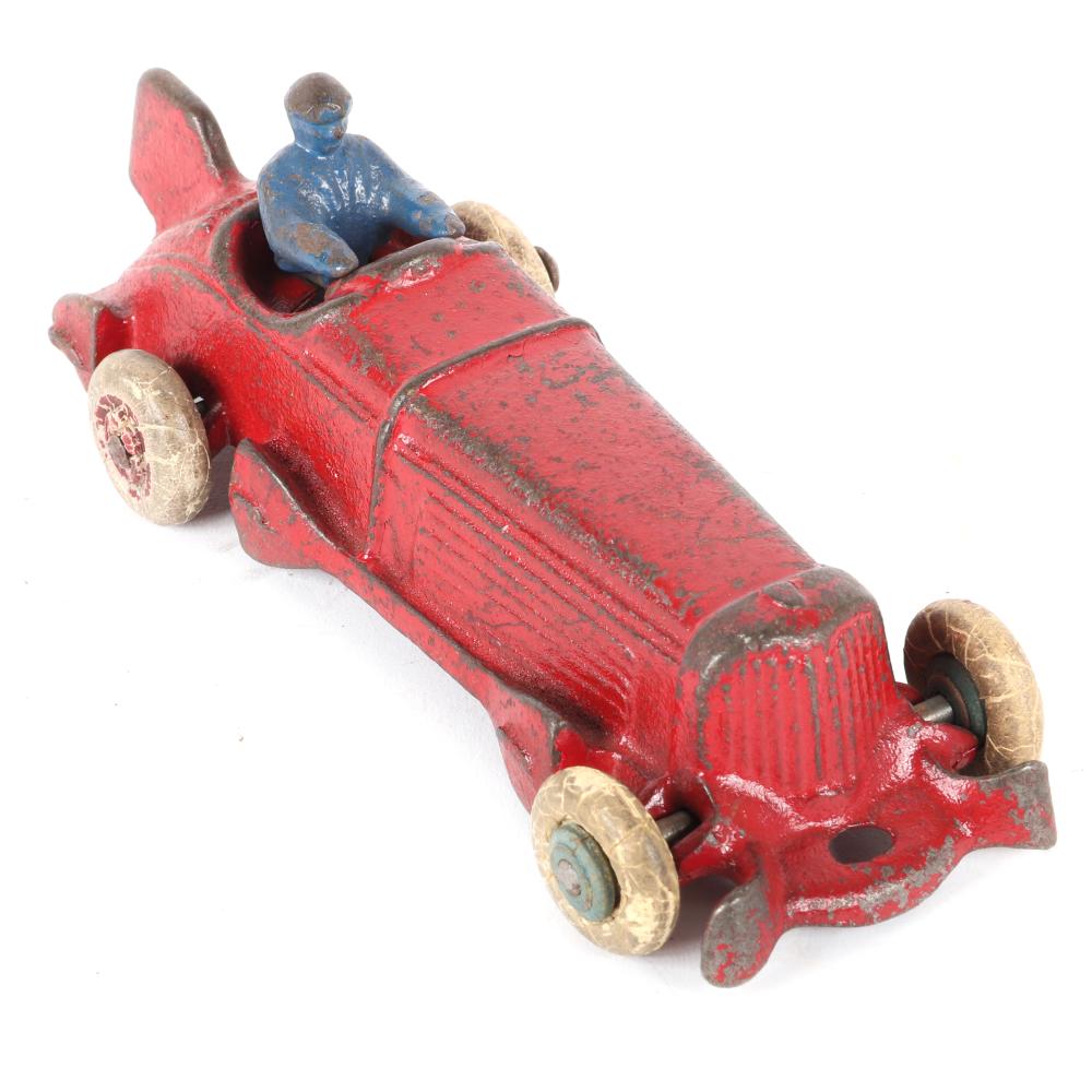 Appraisal: VINTAGE 'S CHAMPION CAST IRON RACE CARVintage 's Champion Cast