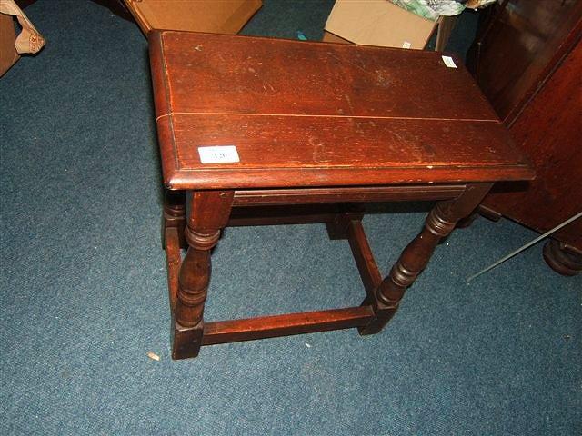 Appraisal: An oak joint stool on turned legs united by stretchers