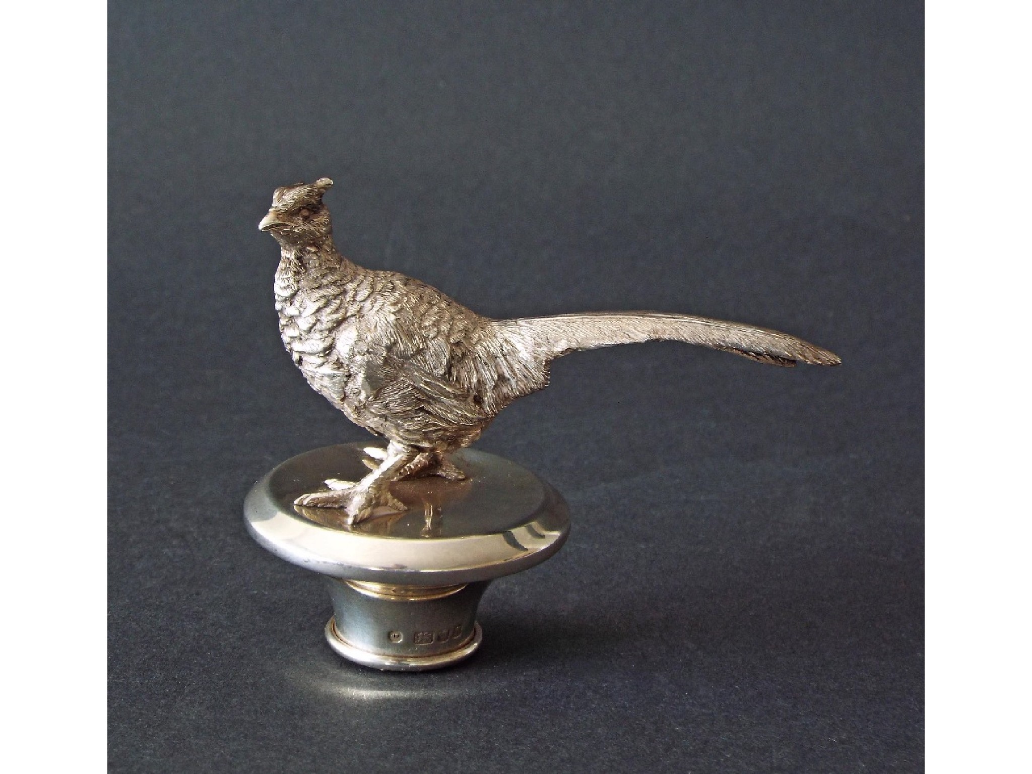 Appraisal: th century silver cork mounted by a pheasant maker John