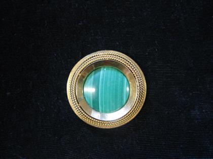 Appraisal: karat yellow gold and malachite brooch Circular cut malachite piece