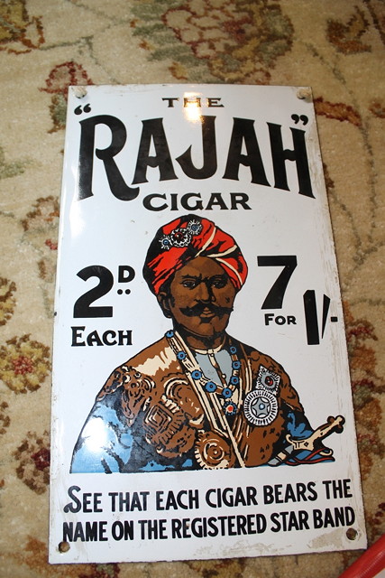 Appraisal: AN INDIAN ENAMEL SMALL ADVERTISING POSTER for The Rajah Cigar