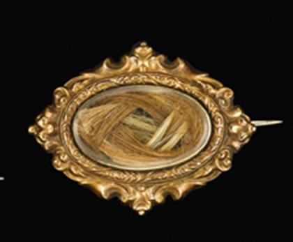 Appraisal: Two-tone gold memorial brooch victorian Features braided blonde and brown