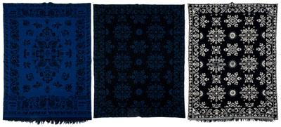 Appraisal: Three jacquard coverlets one black and white with scroll and