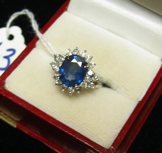 Appraisal: SAPPHIRE DIAMOND AND FOURTEEN KARAT WHITE GOLD RING WITH APPRAISAL