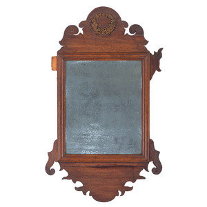 Appraisal: A Chippendale Style Parcel Gilt and Carved Mahogany Looking Glass