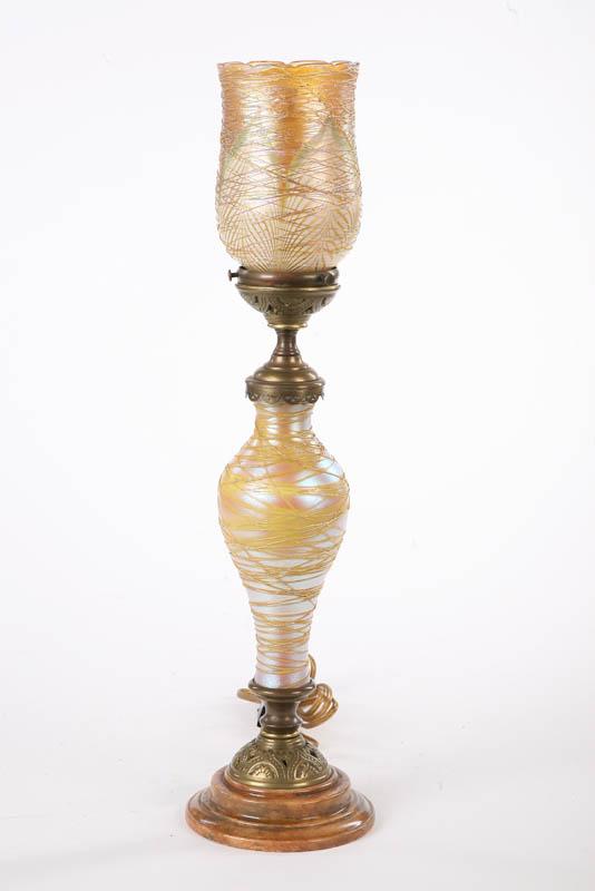 Appraisal: ART GLASS BOUDOIR LAMP Attributed to Durand Having an iridescent