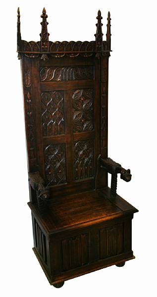 Appraisal: A Gothic Revival carved oak armchair height ft width in