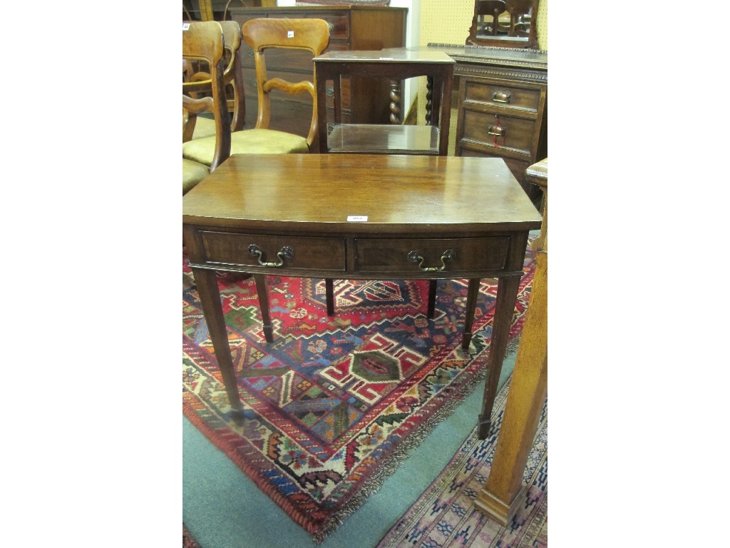 Appraisal: Edwardian mahogany two drawer table and a bedside table