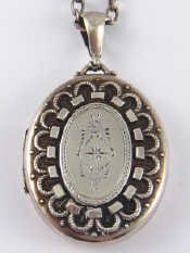 Appraisal: A Victorian silver locket and silver chain locket hallmarked Birmingham