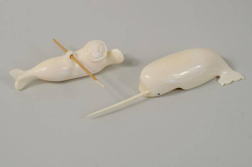 Appraisal: Two Inuit Carved Marine Ivory Sculptures Two Inuit carved marine