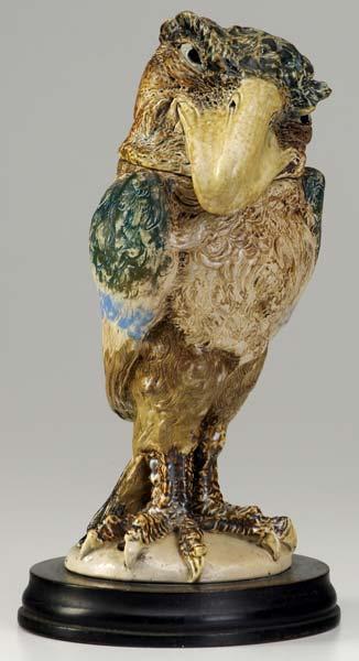 Appraisal: MARTIN BROTHERS Grotesque bird stoneware jar Head collar has partial