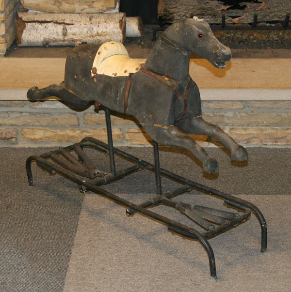 Appraisal: Child's platform rocking horse running wooden body on metal spring