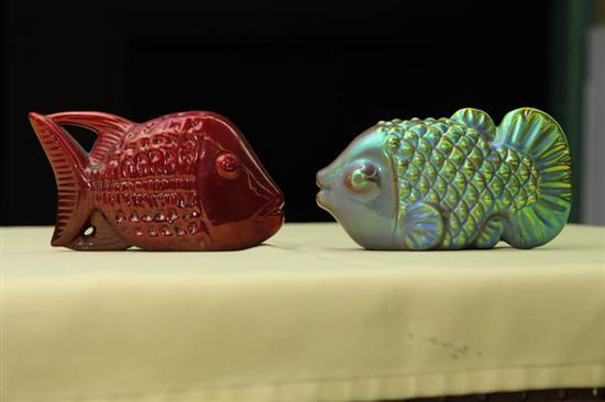 Appraisal: TWO ZSOLNAY FISH Iridescent red h And iridescent green h