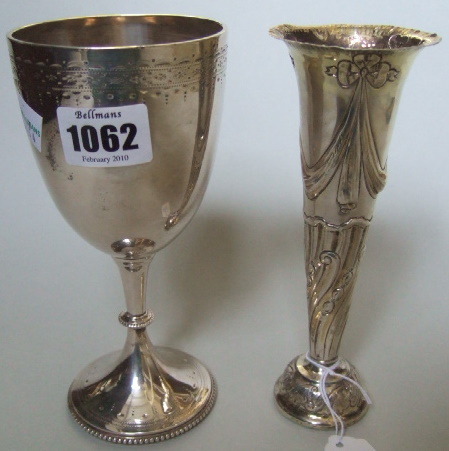 Appraisal: A Victorian silver trophy goblet with engraved decoration and on