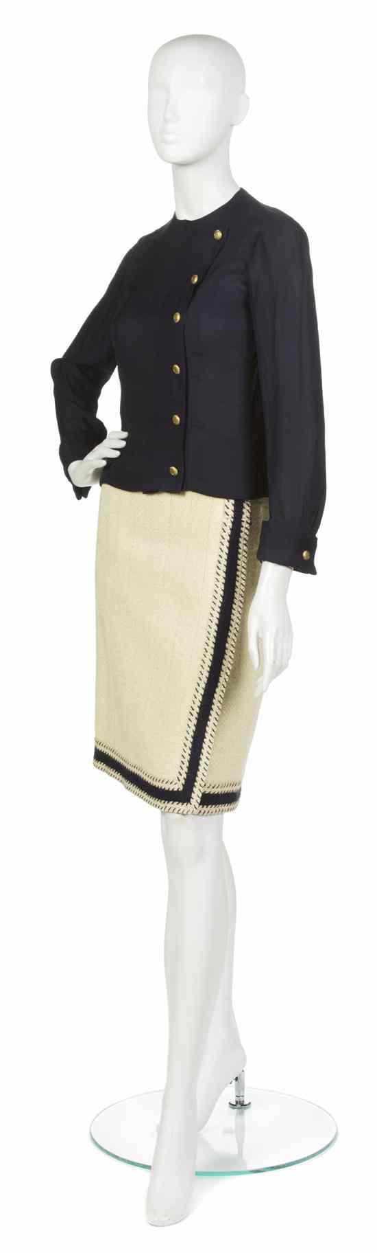 Appraisal: A Chanel Couture Cream Boucle Skirt Suit consisting of a