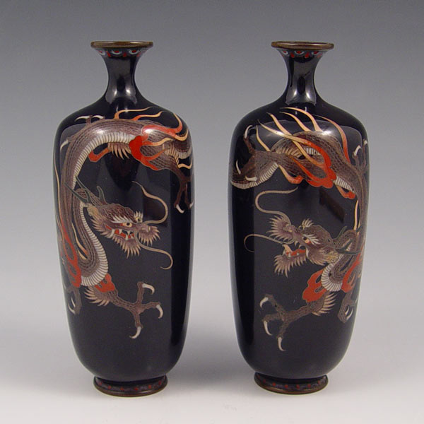 Appraisal: PAIR CLOISONNE BLACK VASES Dragon design on black ground ''