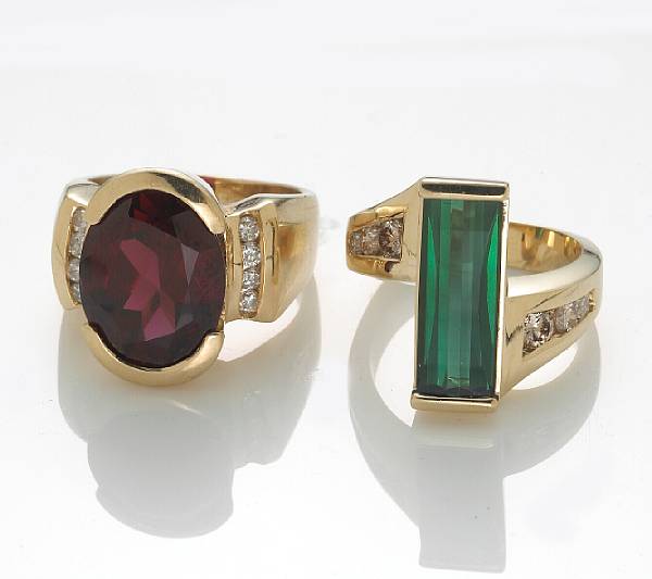 Appraisal: Two diamond garnet green tourmaline and k gold rings size