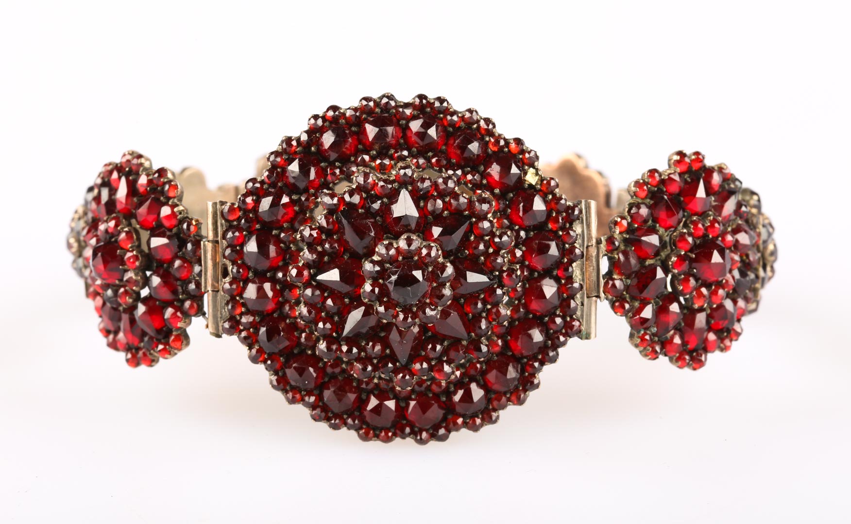 Appraisal: A Victorian Garnet Bracelet gilded faceted multi shaped stones in