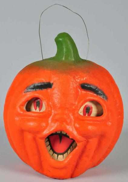 Appraisal: Large Pulp Double-Faced Jack-O-Lantern Description Original paper inserts and tab