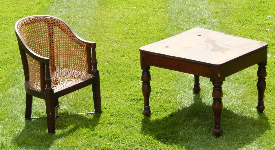 Appraisal: A Victorian mahogany child's chair and an associated table stand