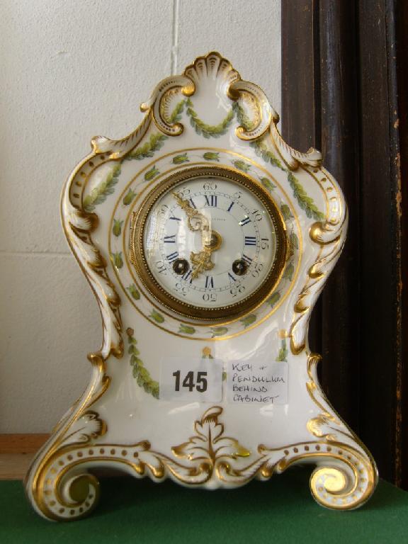 Appraisal: A th century Daniell ceramic cased mantle clock with scrolling