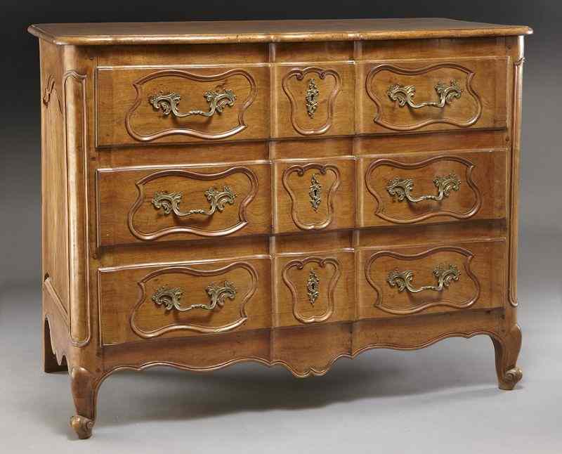 Appraisal: th C French Provincial walnut commode the molded top with