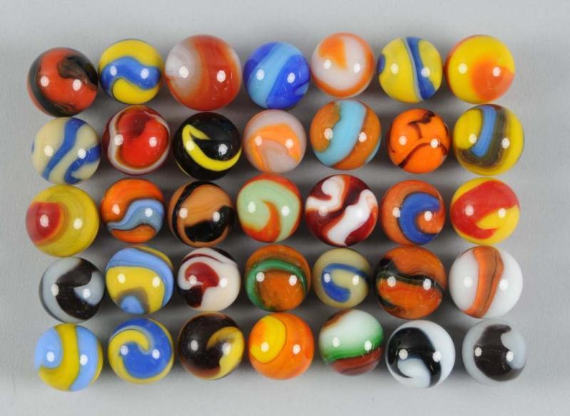 Appraisal: Assortment of Machine-Made Marbles Description Includes approximately marbles most of