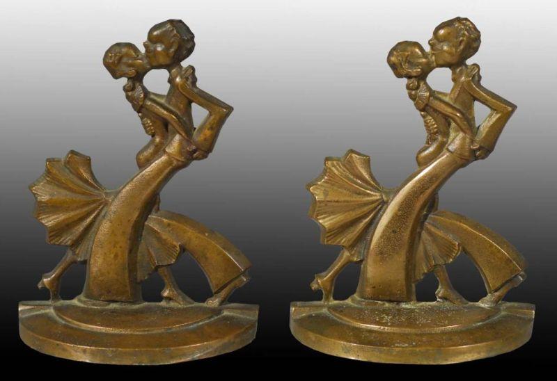 Appraisal: Brass Art Deco Couple Dancing Bookends Description Marked with acorn