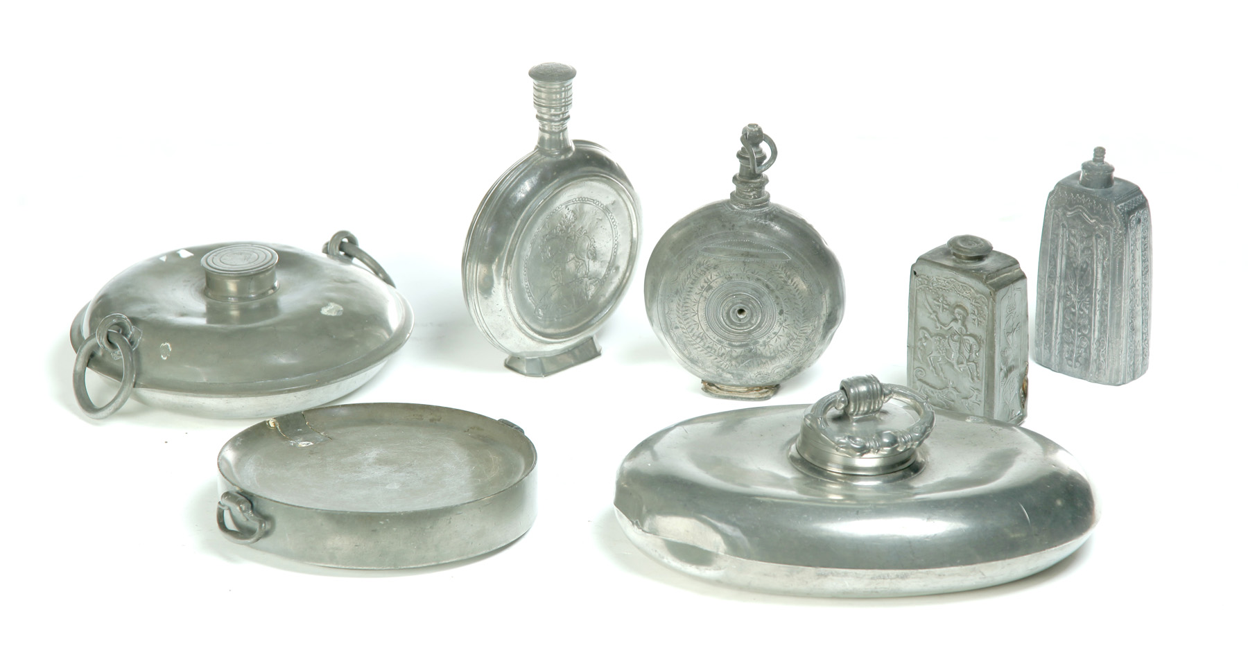 Appraisal: SEVEN PEWTER VESSELS European th century Two foot warmers dia