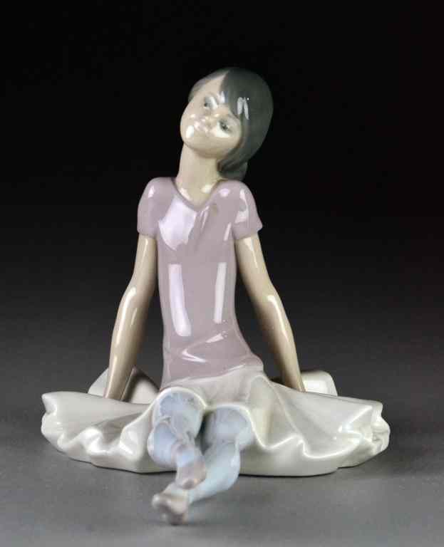 Appraisal: Lladro Porcelain Figurine ''Lavender Ballerina''Depicting a seated ballerina with long