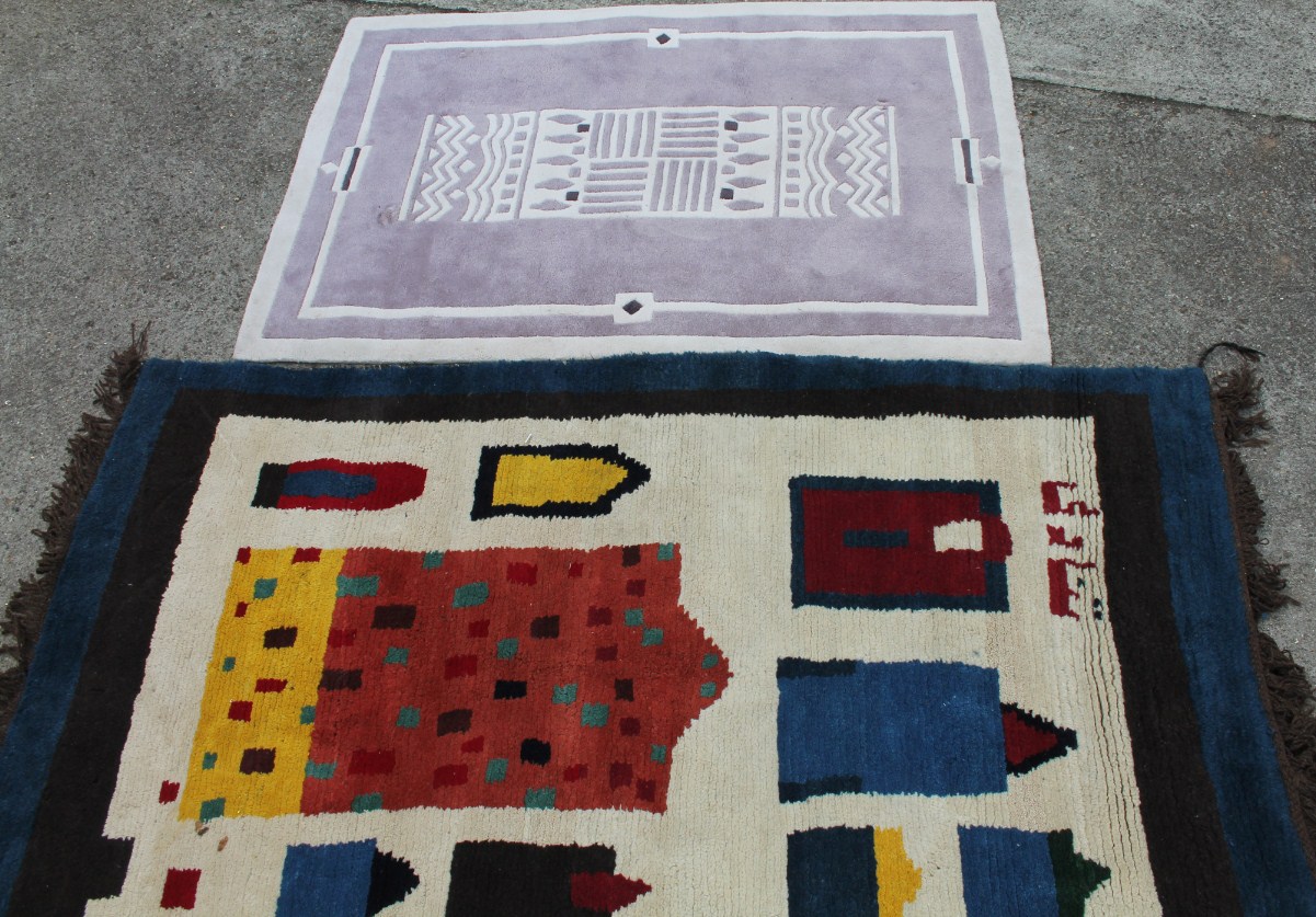 Appraisal: A modern woolen rug in a geometric pattern predominantly in