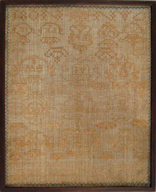 Appraisal: English silk on linen sampler dated with repeating medallions and