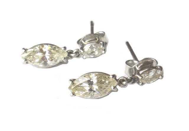 Appraisal: A pair of diamond set two stone earrings each claw