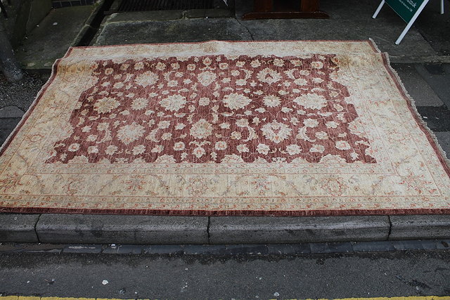 Appraisal: A ZIEGLER STYLE PERSIAN SOFA CARPET with central foliate designs