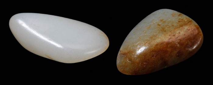 Appraisal: Two Jade Pebbles Chinese one translucent white Hetien drop form