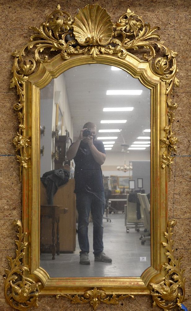 Appraisal: Carved Giltwood Mirror having large top center shell flanked by