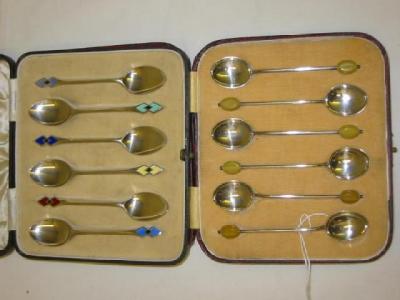 Appraisal: A SET OF SIX ENAMEL TEASPOONS with two enamel lozenges