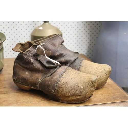 Appraisal: Pair of antique French wood leather clogs