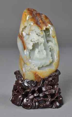 Appraisal: A Very Fine Chinese Carved Jade BoulderFinely carved to depict