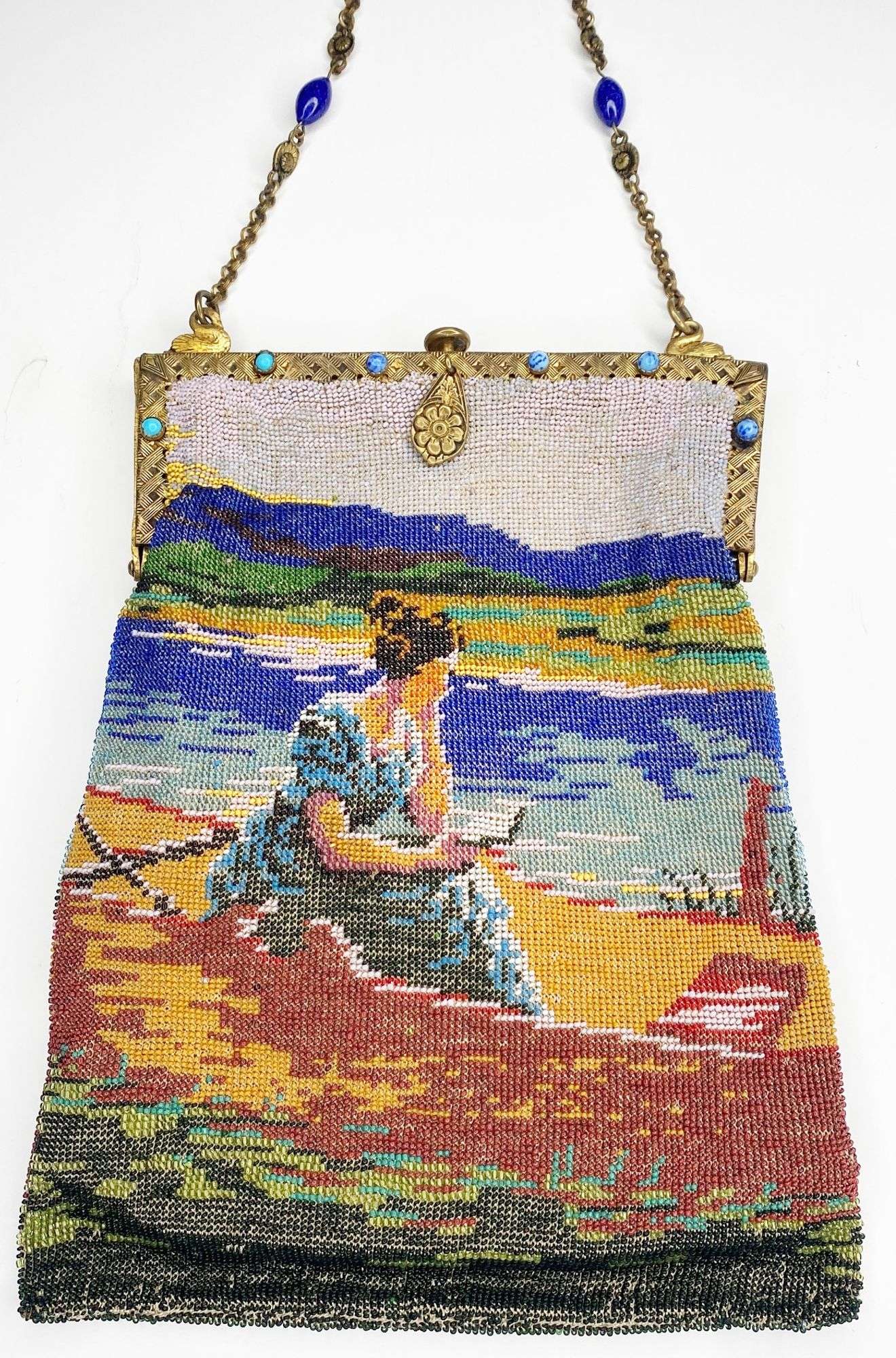 Appraisal: Micro Beaded Purse with Woman Reading Book Seascape long at