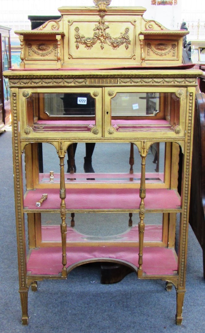 Appraisal: A th century gold painted shelf back side cabinet with