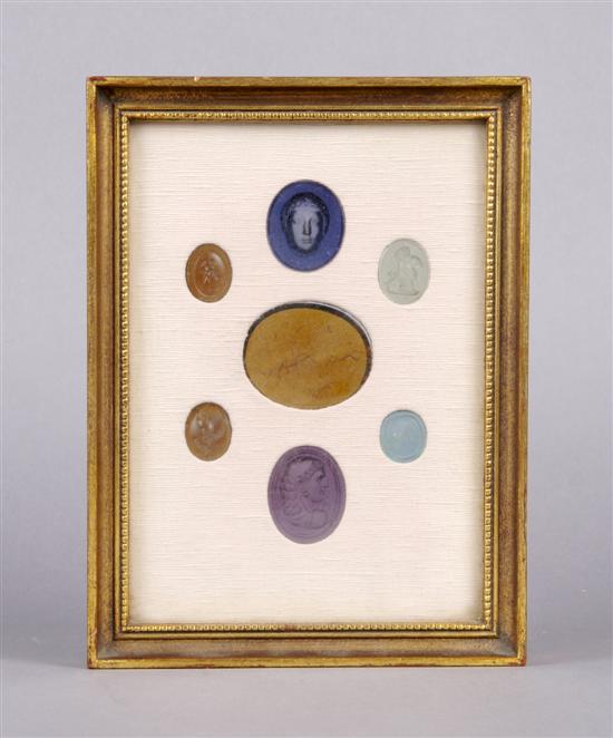 Appraisal: A Collection of Seven Glass Intaglios Height of frame overall