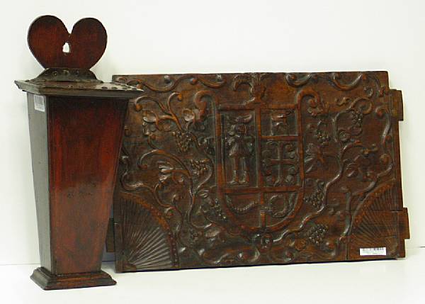 Appraisal: An English oak pipe box and Continental armorial carved walnut