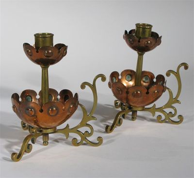 Appraisal: A pair of copper and brass chambersticks probably Benham Froud